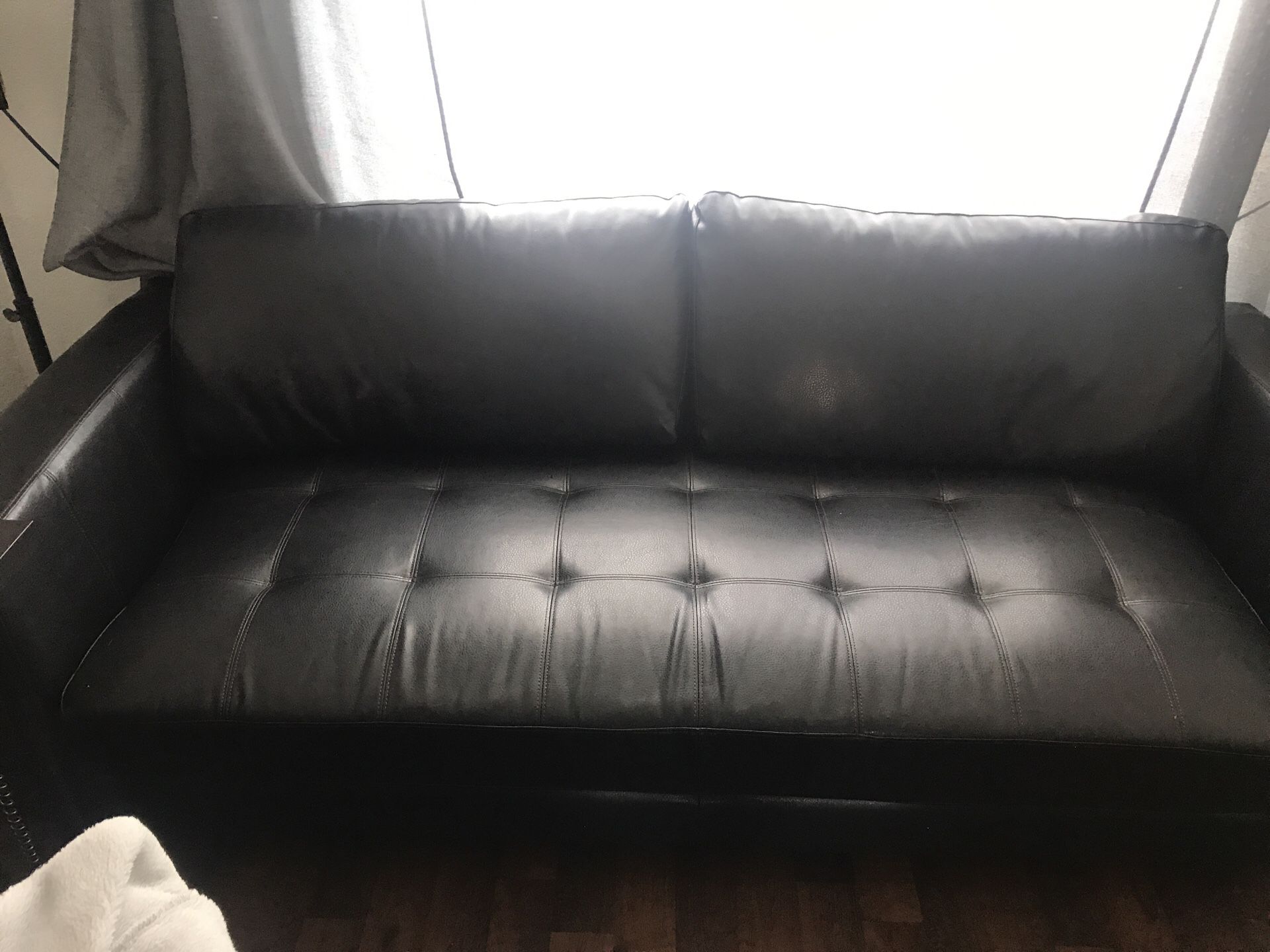 Leather sofa with ottoman Pellissima