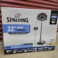 Spalding 32-Inch Portable Basketball Hoop with Eco-Composite Backboard & Telescoping Height Adjustment