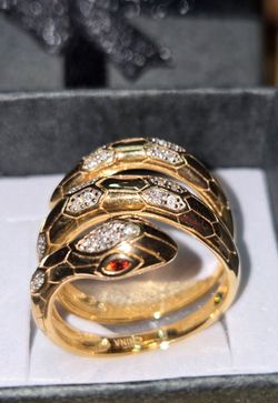 1/10 ctw Genuine Diamond and Garnet wrap Snake ring. 18k YG over .925 Sterling Silver. Size 7. PRICE FIRM.