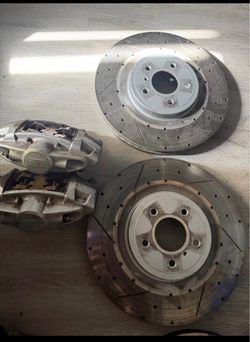 Infiniti akebono brakes (missing a one caliper)