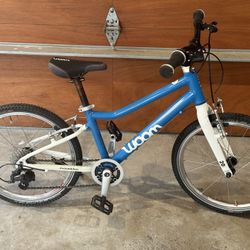 Woom 4 20 inch 7 speed light weight kids bike great shape 
