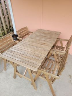Patio wooden table with four chairs