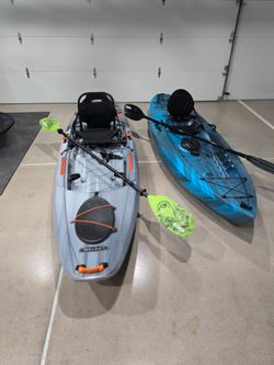 TWO Almost New kayaks with paddles & Malone Folding SUV/Car racks