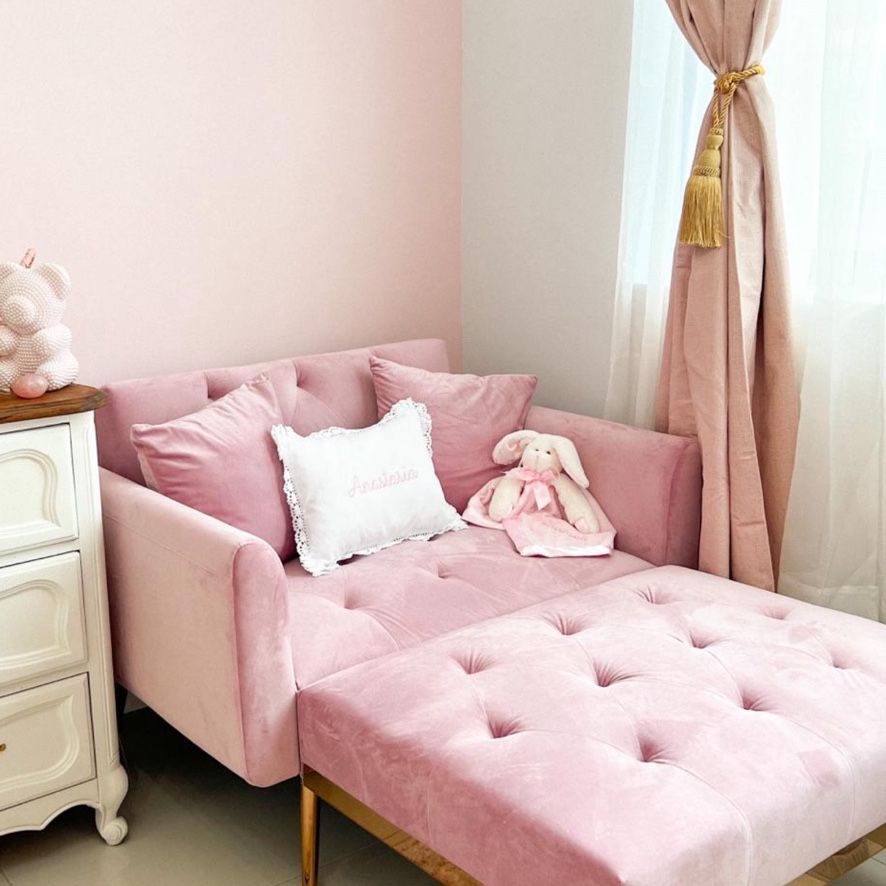 Pink Sofa that becomes a small bed