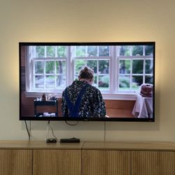 TLC 55” Class 4-Series 4K UHD HDR Roku Smart TV 