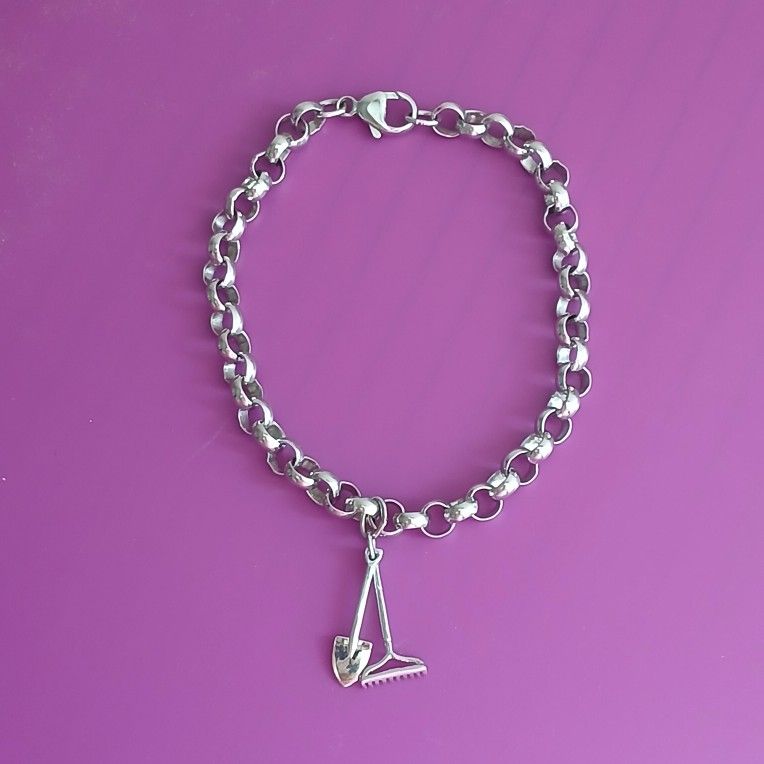 Sterling Silver Bracelet with Rake and Shovel Charms. Gardening themed charms bracelet 