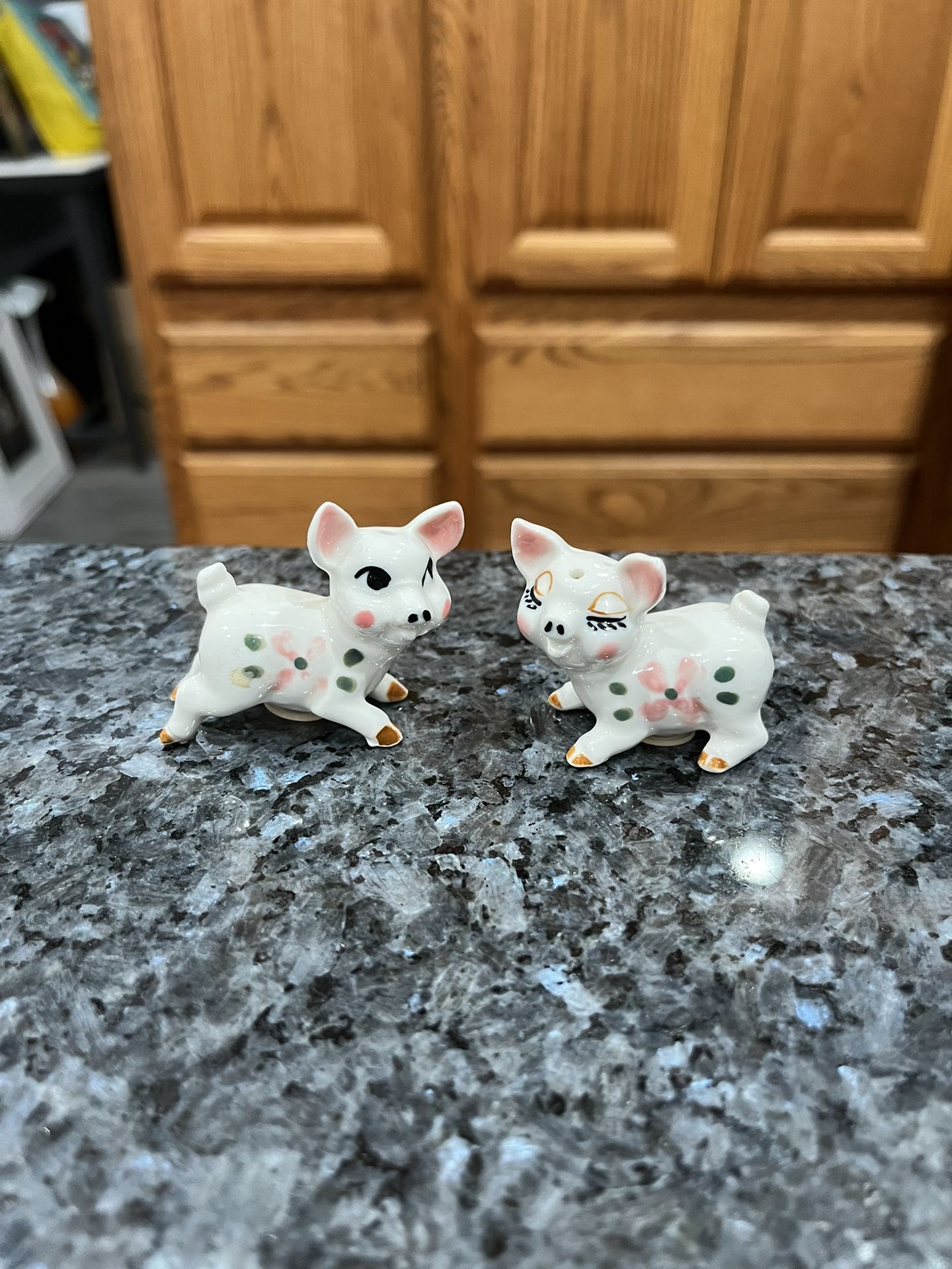 Ceramic Vintage Miniature Pig Genuine Bone China pair of salt and pepper shakers. Made I Japan with sticker.