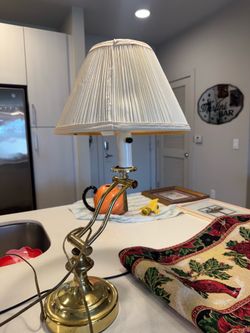 Gold and cream working vintage lamp with hinge
