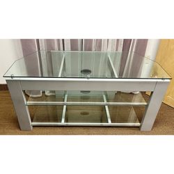 Silver TV stand glass shelves, cable holes. Media Table. Entertainment Center