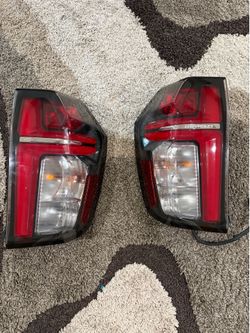 Tahoe & suburban tail lights set OEM