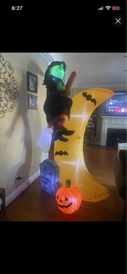 Inflatable witch on moon