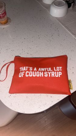 AWFUL LOT OF COUGH SYRUP BAG
