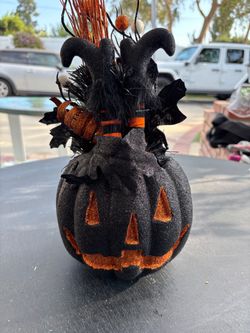 Witch’s crash landing in pumpkin