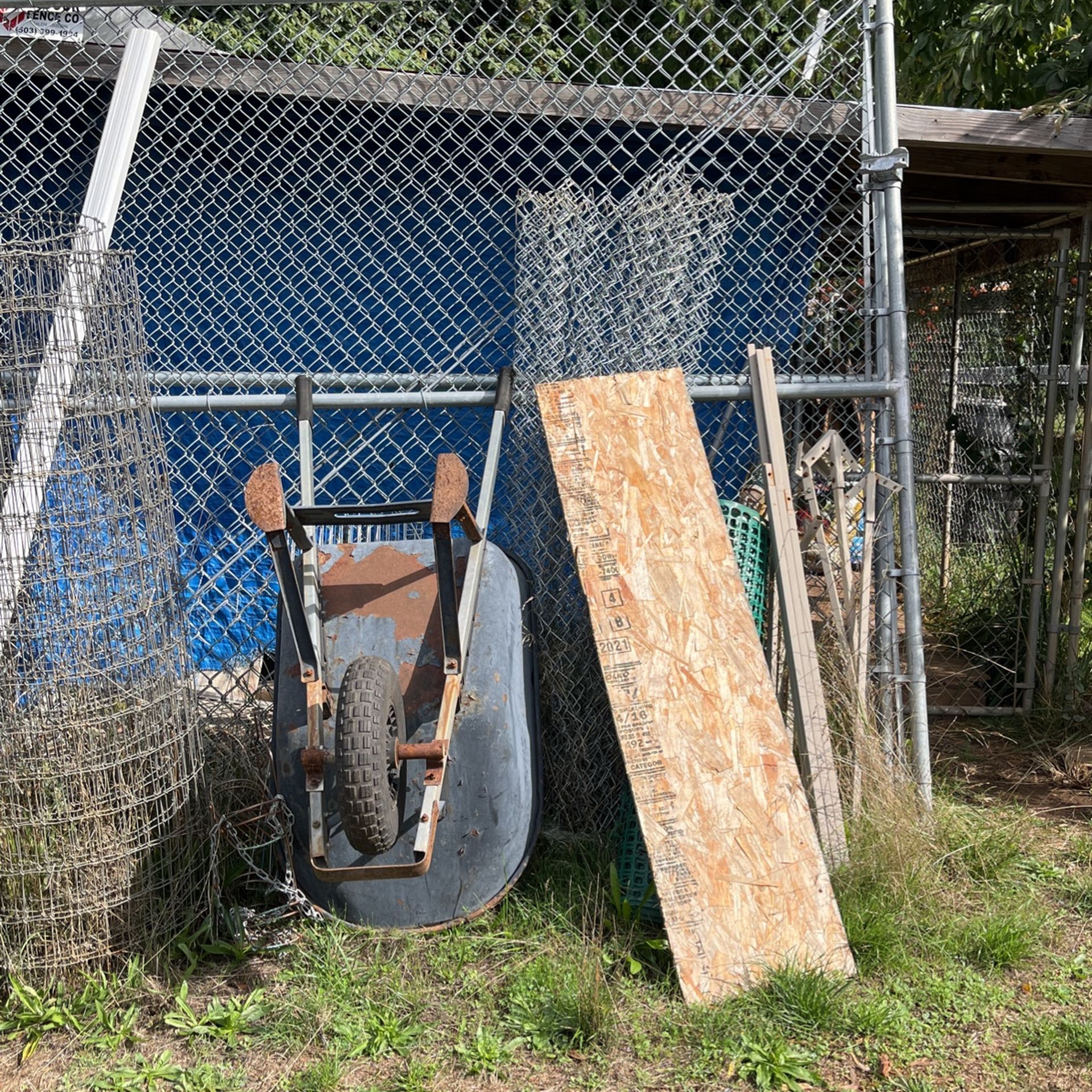 Fence And Wheelbarrow