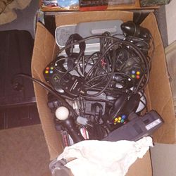 Box Of Video Game Consoles, Controllers, And Games