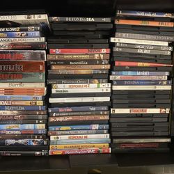 250 DVDs Give Or Take A Few Boxes About Half Are Still Sealed 