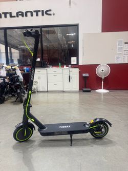 Electric scooter with shock absorption