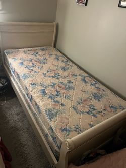 Nice twin bed frame with mattress.  Both in great shape.
