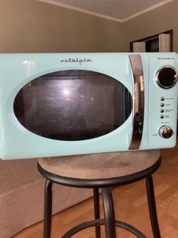 Nostalgia microwave. In great shape. Has been used very few times. Clean and works perfectly