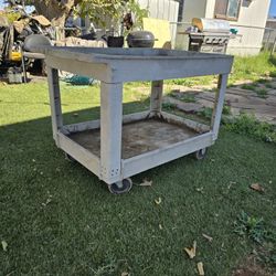 Rubbermaid Commercial heavy-duty, two-shelf utility cart. 