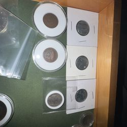 5 steel pennys and 2 Indian head pennys 1935 nickel