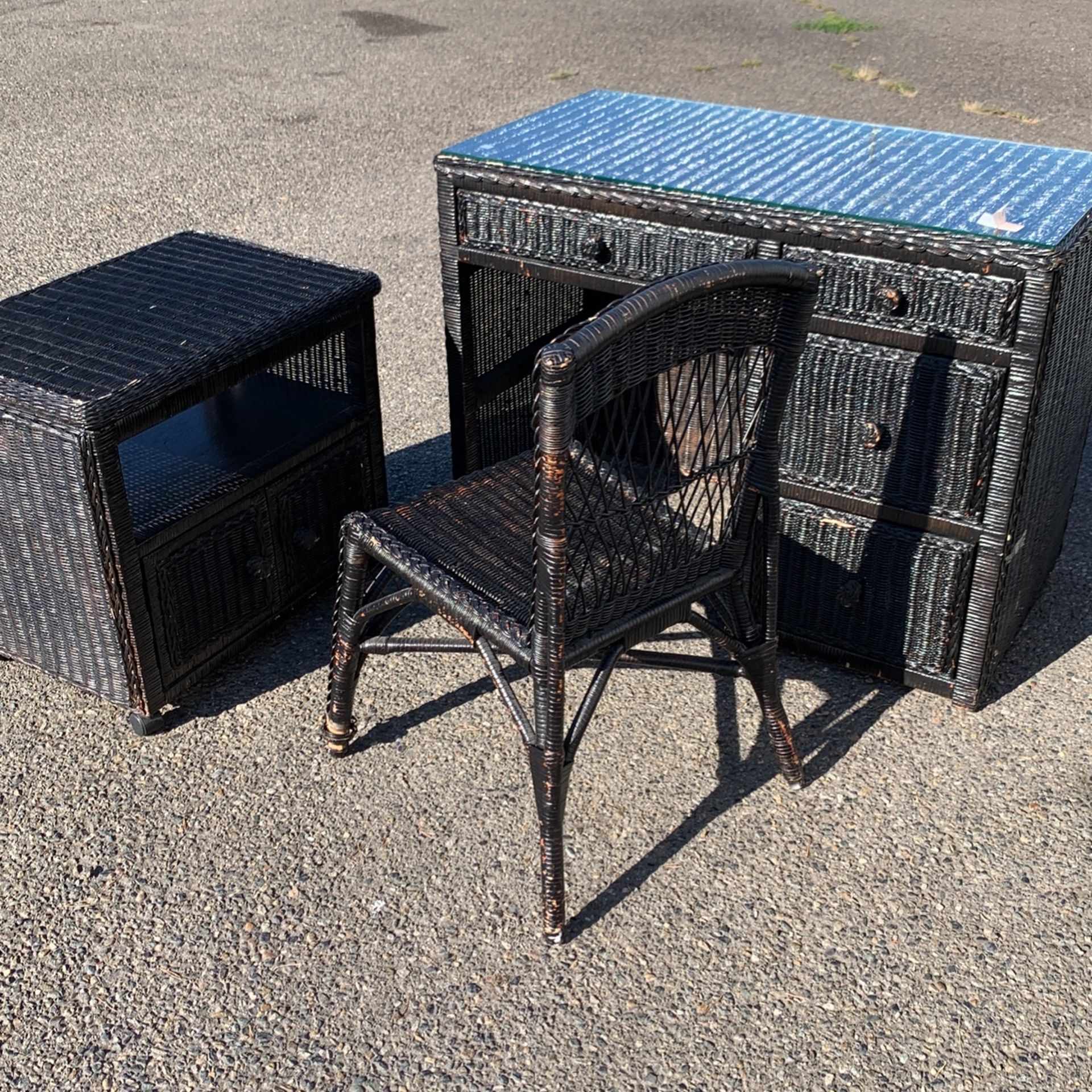 Black, Wicker Desk, Chairs, And Small Table