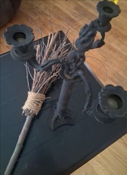 Candlestick and witch's broom