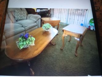 Coffee table and two end tables, they fold down on the sides or open up the rain.They're all open and really good condition