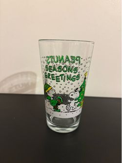 Vintage Snoopy 2011 Peanuts Seasons Greetings tumbler featuring Linus and Snoopy