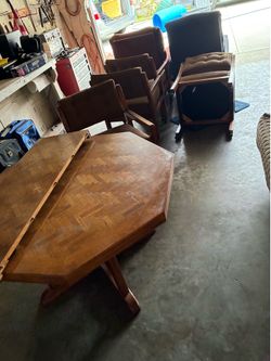 Dining room table with leaf 4 chairs with wheels