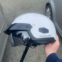 White medium size Helmet with a visor