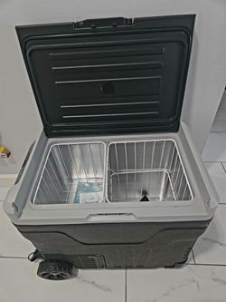 NEW NEVER USED PORTABLE ELECTRIC COOLER 53QT
