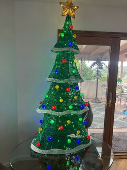 Update Christmas stuff for sale; 1 Huge pre-lit wreath 5ft, and 3.5 pine cone wreath pre-lit Christmas