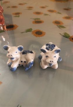 Antique porcelain pig figures