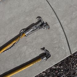 Yard work trimming poles . Tree trimmer