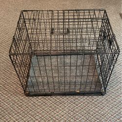 Mid Size Dog Crate  18 Inches High, 24 Inches Long and 17 Wide.