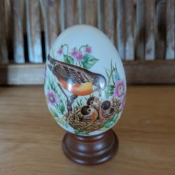 TWO AVON COLLECTIBLE VINTAGE EGGS WITH WOODEN STANDS, SPRING AND AUTUMN