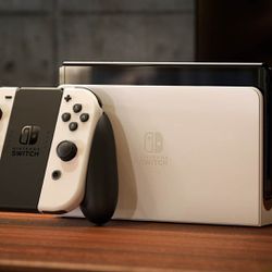 Nintendo Switch Oled Bundle (2 Games Included)
