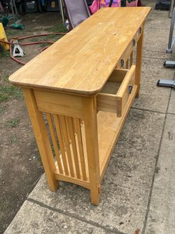 Sofa table with three drawers
