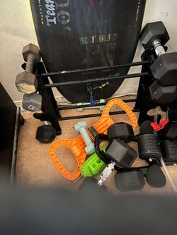 Pairs of 5, 10, 20 and 25lb dumbbells and kettlebell attachment and dumb bell rack . $100