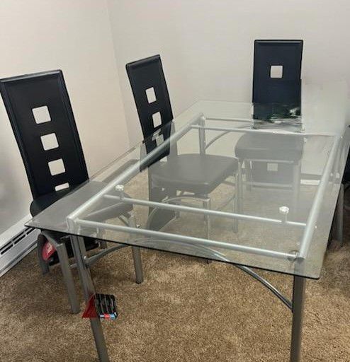 Glass Top Dining Table & 6 BRAND NEW Modern Black Chairs