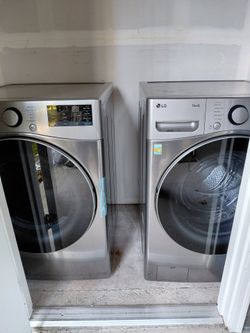 LG Steel Front Load Washer/Dryer set, Briefly used; like new