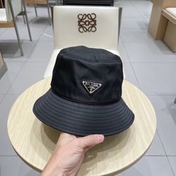 Prada bucket hats