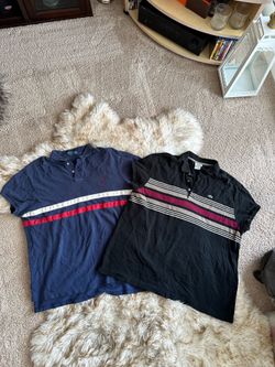 Pre-owned short-sleeve polo shirts from Polo Ralph Lauren and Lacoste. The Polo Ralph Lauren shirt is size XXL, made of 100% cotton, and is navy blue 