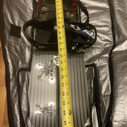 Burtons Snow Board With Bindings And Travel Bag.