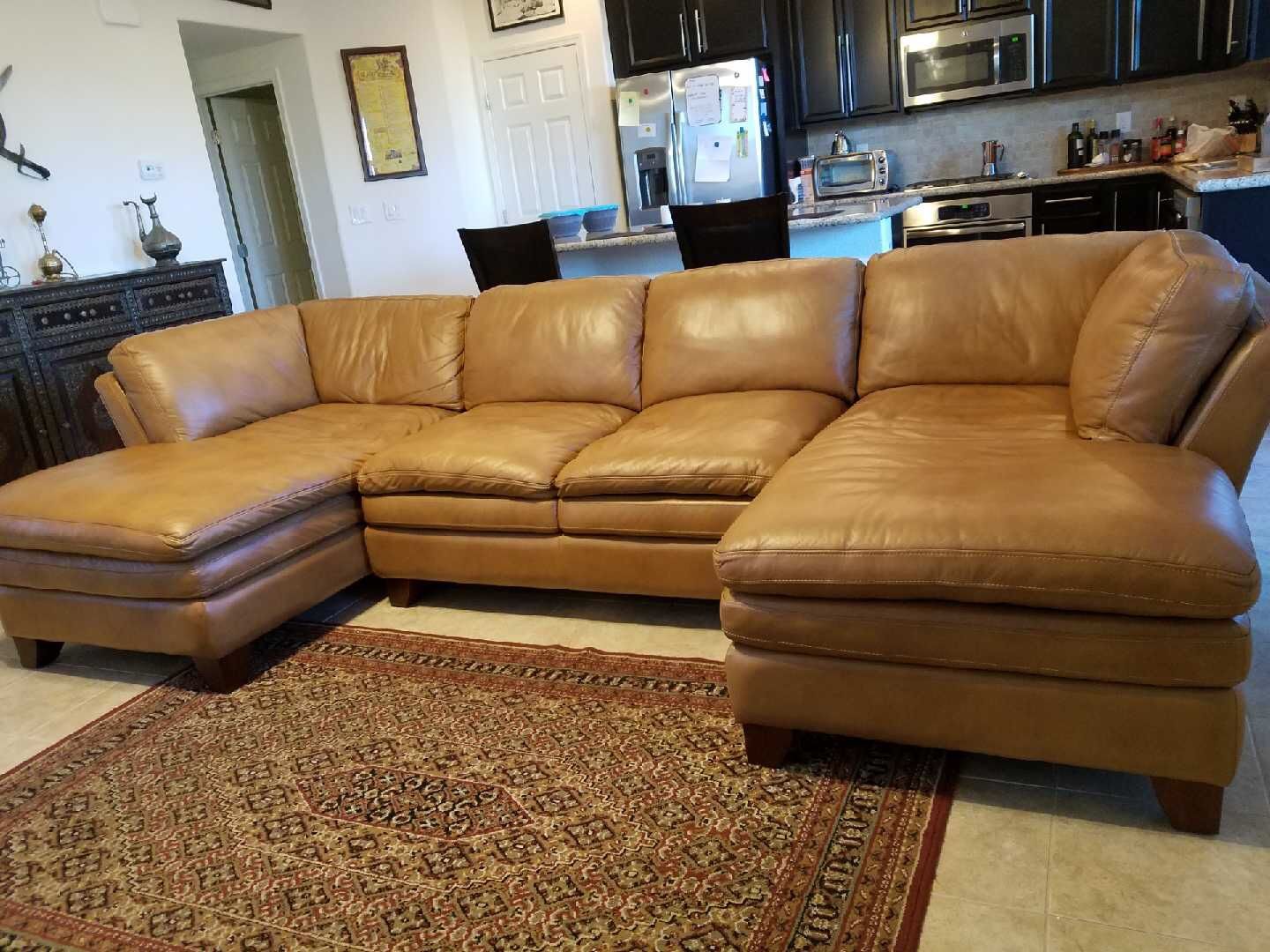 Great 100% leather couch, your house needs it