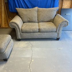 2 Love Seats And Ottoman 