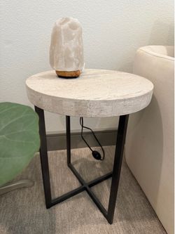 Travertine side table (H 21” x D 17”)