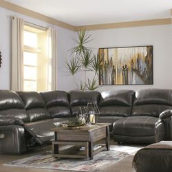 Hallstrung Gray Leather Reclining Sectional 
