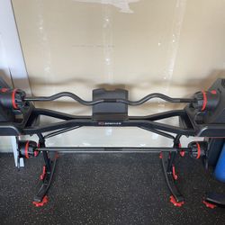 BowFlex SelectTech 2080 Adjustable Barbell with Curl Bar, Extra Weights, And Stand. 
